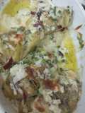 Baked potato slice with cheesy and creamy sauce