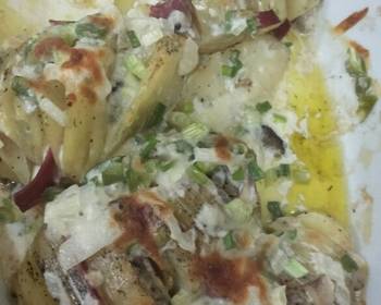 Fast Cooking Methods Baked potato slice with cheesy and creamy sauce Delicious