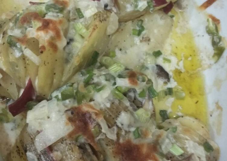 Baked potato slice with cheesy and creamy sauce Baked potato slice with cheesy and creamy sauce