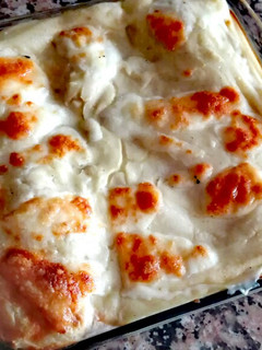 Una foto de Burritos gratinados