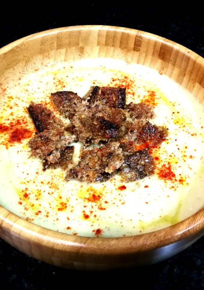 Una foto de Crema de hinojo con pan alemán 3 cereales - veggie