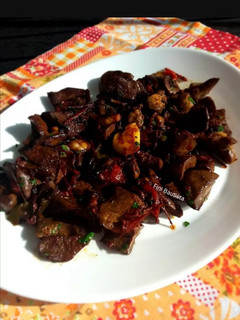 Una foto de Asadura frita con pimientos