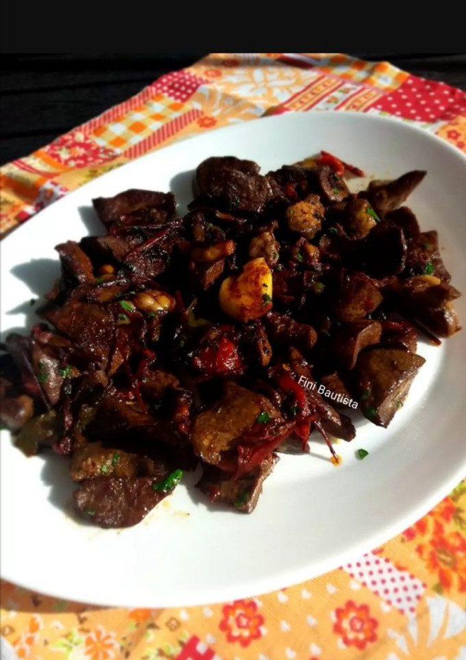Una foto de Asadura frita con pimientos