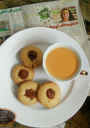 A picture of Wheat oats Cookies with doodh Patti.