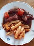 Rabo de ternera estofado con vino tinto y chocolate puro