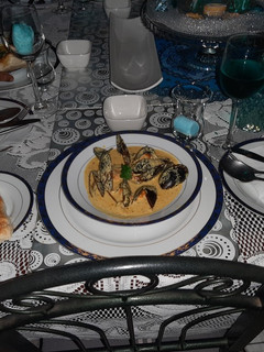 A picture of Indian spiced creamy mussels.
