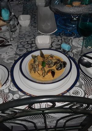 A picture of Indian spiced creamy mussels.