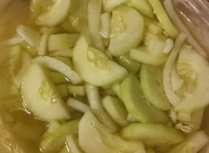 A picture of Old-fashioned Cucumbers & Onions in Vinegar "Dressing".