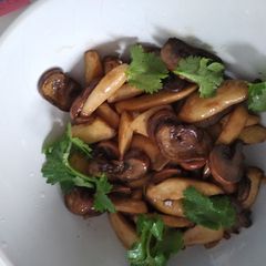 A picture of Mixed mushrooms with soy butter.