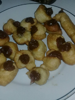 Una foto de Buñuelos con relleno de dulce de leche😍