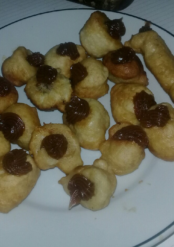 Una foto de Buñuelos con relleno de dulce de leche😍
