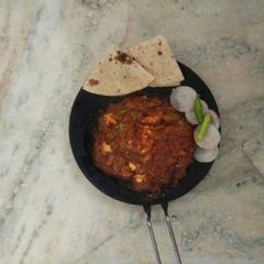A picture of Tawa paneer ki sabji salad or fulka.