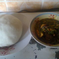 A picture of Pounded yam and Okro soup.