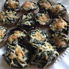 A picture of Spinach stuffed mushrooms.