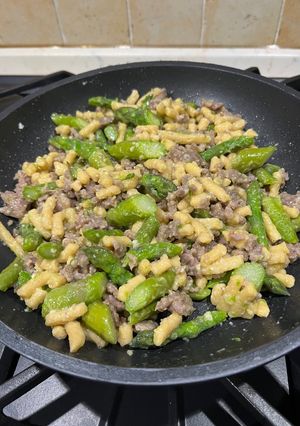A picture of Passatelli with Asparagus and Sausage.