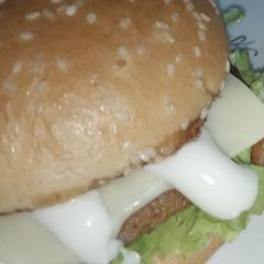 A picture of Chicken Patti cheesy burger 🍔🍔.