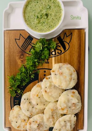 A picture of Rava Idli with Coriander Curd Chutney.
