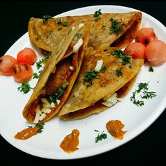 A picture of Indo mexican Tacos.