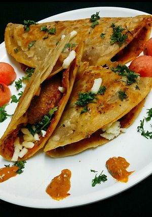 A picture of Indo mexican Tacos.