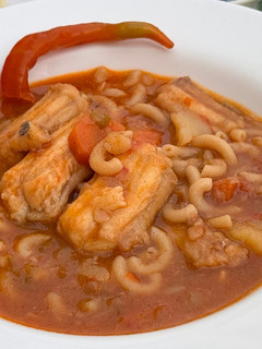 Una foto de Guiso colorao de pescado