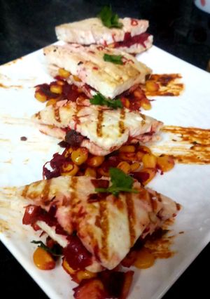 A picture of Stuffed Beetroot Corns sandwich in Paneer Slices.