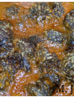 Una foto de Morcilla en salsa de tomate