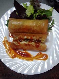Una foto de Rollitos de pollo y verduras