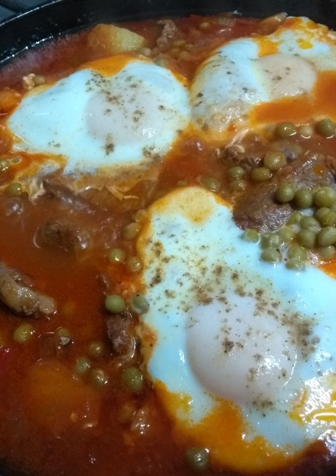 Una foto de Bifes con salsa portuguesa