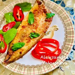 A picture of Mackerel with paprika in the oven.