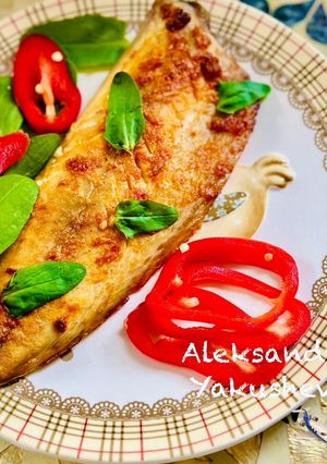 A picture of Mackerel with paprika in the oven.