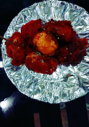 A picture of Chicken butter pops seasame.