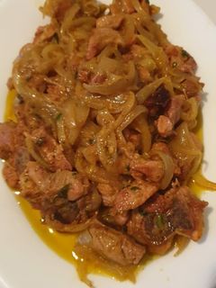Una foto de Chuletas de pavo encebolladas al mostaza