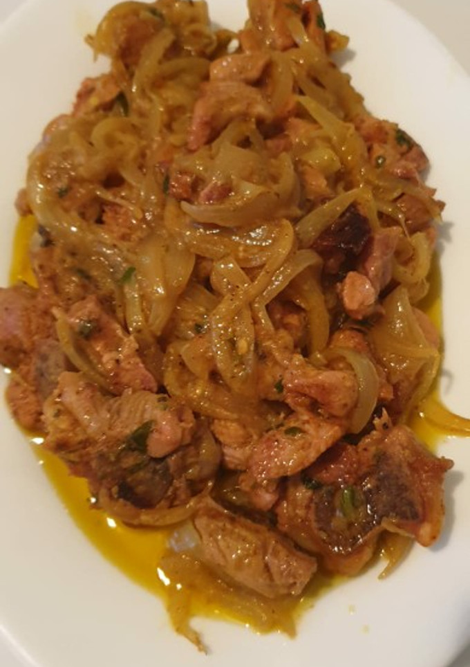 Una foto de Chuletas de pavo encebolladas al mostaza