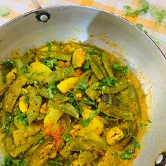 A picture of Simba Baigana Besara (Lima beans/Sem Phali & brinjals in mustard paste).