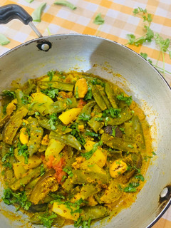 A picture of Simba Baigana Besara (Lima beans/Sem Phali & brinjals in mustard paste).