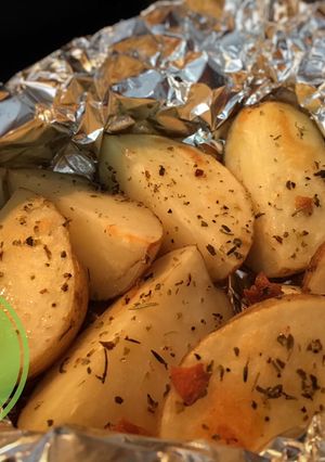 Una foto de Papas Hierbas Italianas