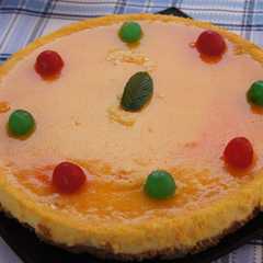 Una foto de Tarta de queso y naranja