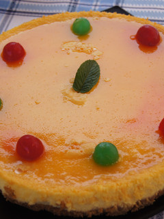 Una foto de Tarta de queso y naranja