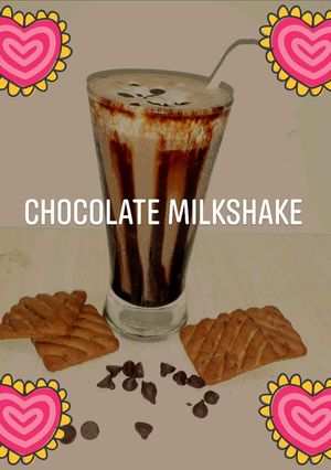 A picture of Chocolate milkshake with leftover cake and biscuits.
