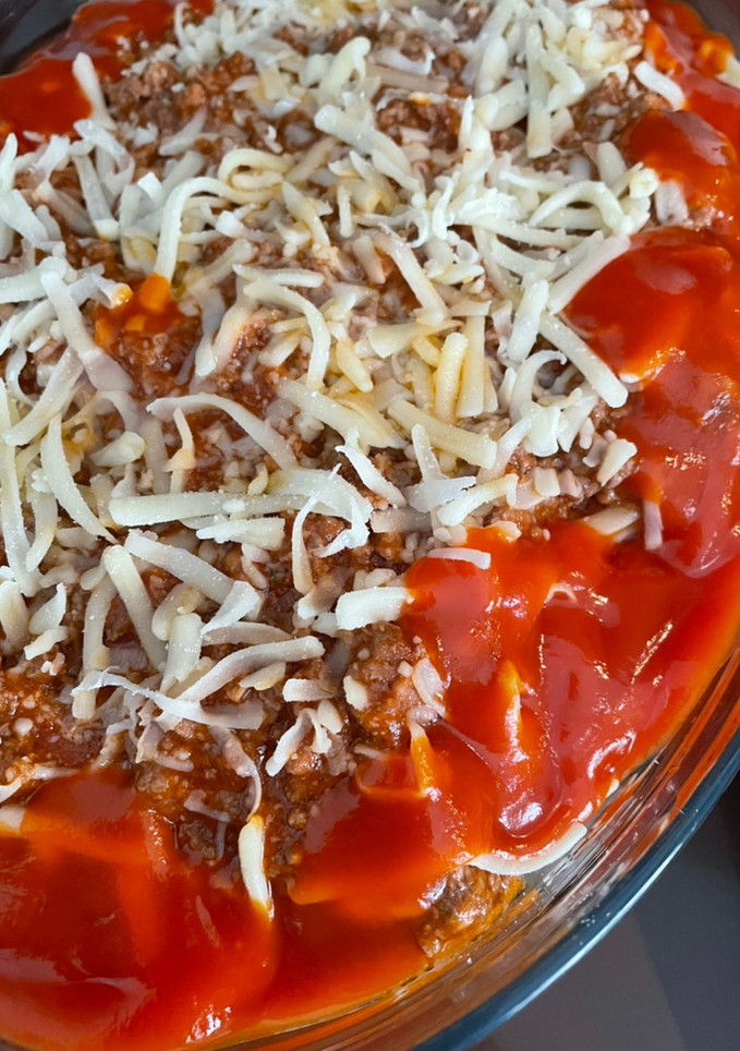 Una foto de Spaghetti con picadillo y queso
