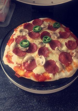 صورة لوصفة بيتزا بطريقتي 😍😋❤️