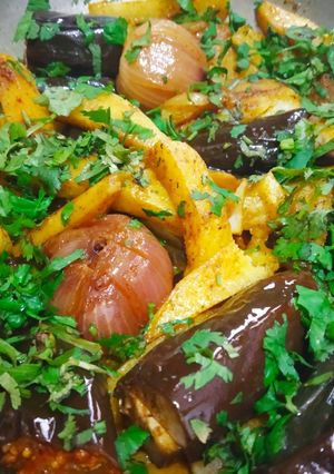 A picture of Potato brinjal and onion stuff.
