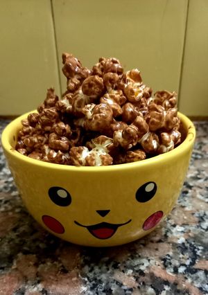 Una foto de Pochoclos con chocolate 🍫