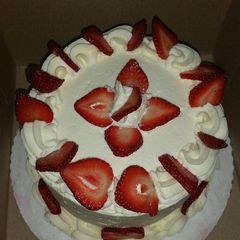 A picture of Strawberry Short Cake with real cream.