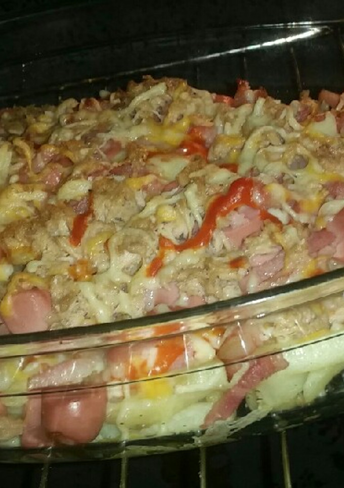 Una foto de Pizza con base de patatas fritas