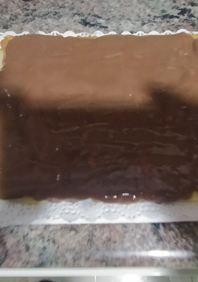 Una foto de Tarta de galletas, chocolate y natillas