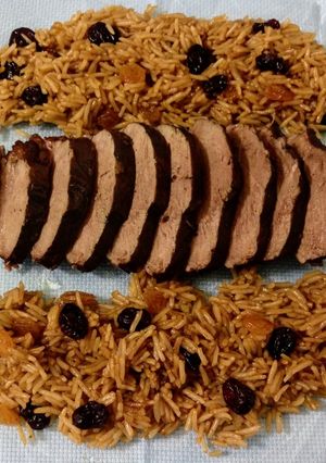 Foto principal de Arroz con pato salteado con Moscatel y pasas