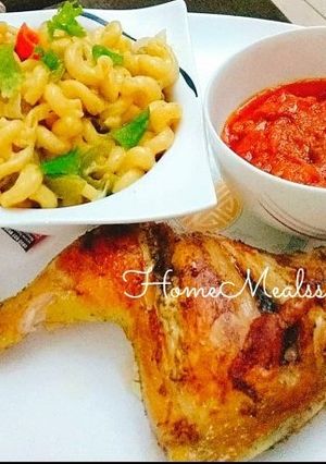 A picture of Marc Cheese Pasta with grilled chicken.