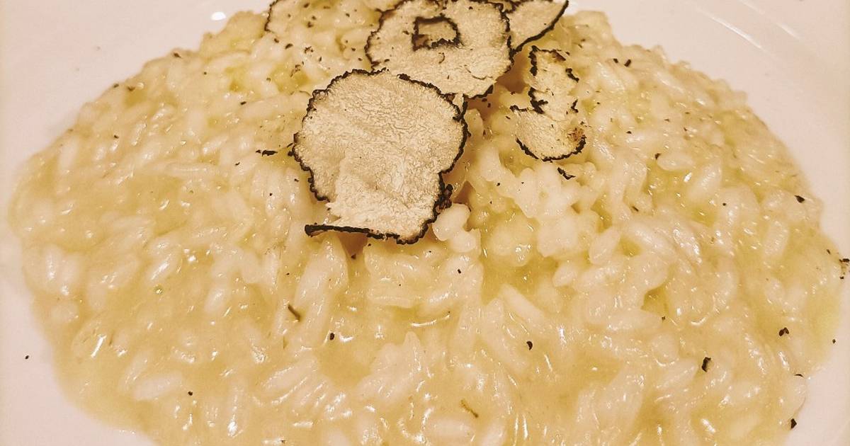 Ricetta Risotto mantecato al parmigiano reggiano DOP e tartufo nero di