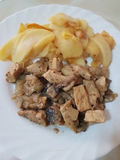 Una foto de Cerdo con mostaza y manzanas caramelizadas
